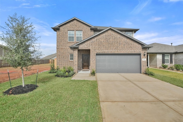 view of front of house featuring a front lawn and a garage