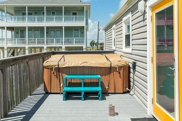 deck with a hot tub