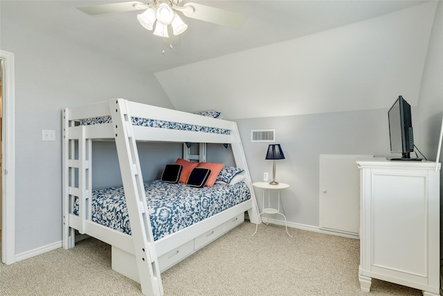 bedroom with carpet flooring, ceiling fan, and lofted ceiling