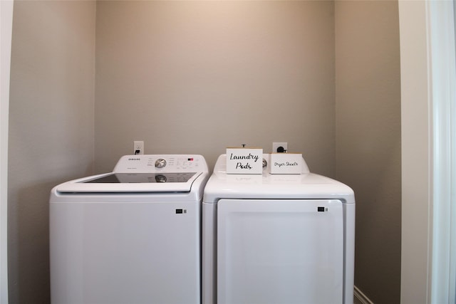 laundry room with independent washer and dryer