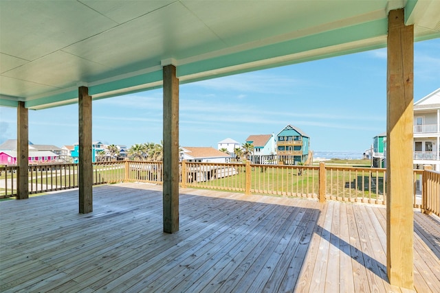 wooden deck featuring a water view