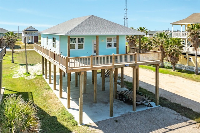 exterior space with a yard and a carport