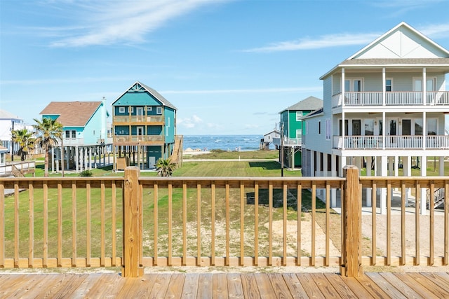 wooden deck with a water view