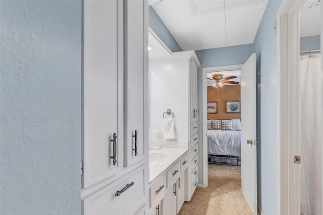 full bathroom featuring connected bathroom, vanity, and a ceiling fan