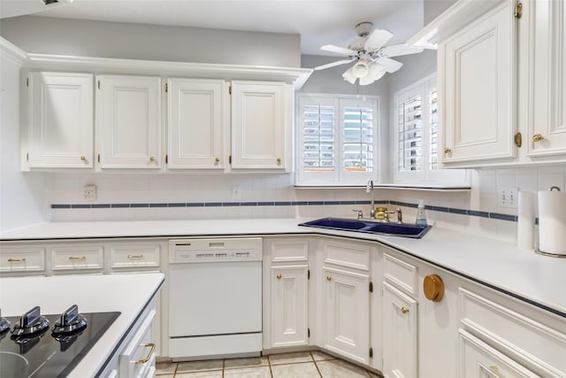 kitchen featuring black electric stovetop, a ceiling fan, white cabinets, a sink, and dishwasher