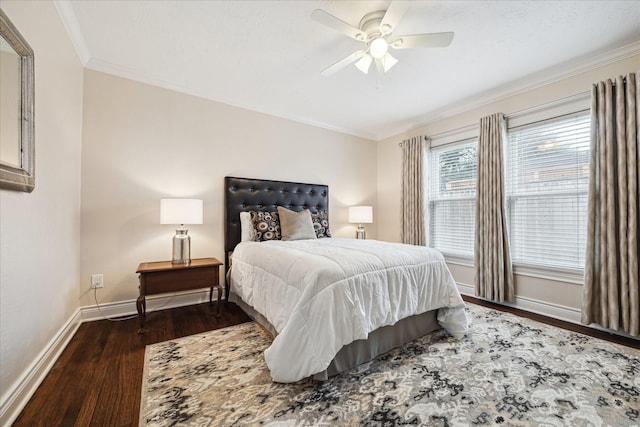 bedroom featuring ornamental molding, ceiling fan, and dark wood-type flooring