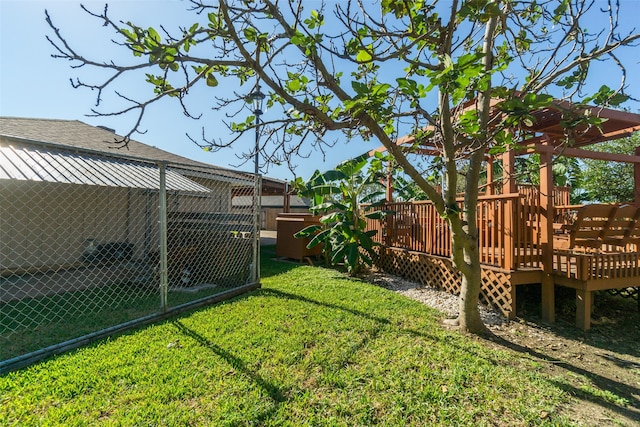 view of yard with a wooden deck