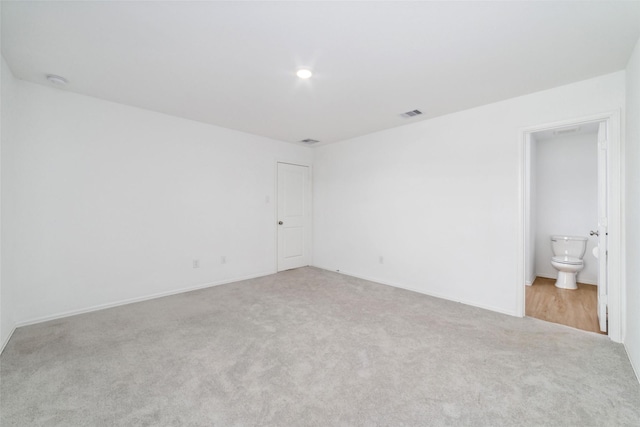 unfurnished room featuring carpet floors