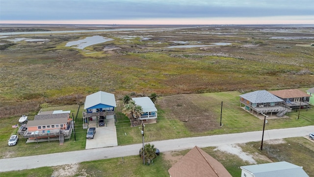 birds eye view of property featuring a rural view