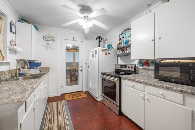 kitchen with white cabinets, stainless steel electric range, white refrigerator, and sink