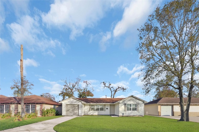 ranch-style home featuring a front lawn and a garage