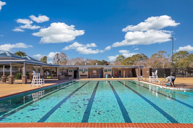 view of swimming pool featuring a patio area