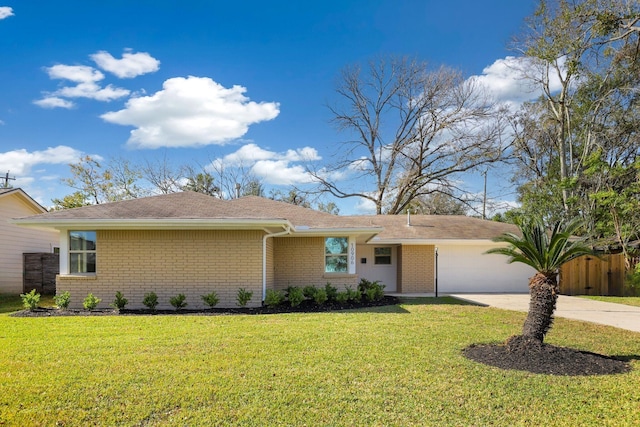 ranch-style house with a front yard and a garage