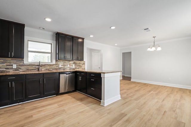 kitchen with tasteful backsplash, stainless steel dishwasher, a chandelier, pendant lighting, and ornamental molding