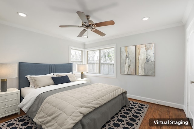 bedroom featuring ceiling fan, crown molding, and dark wood-type flooring