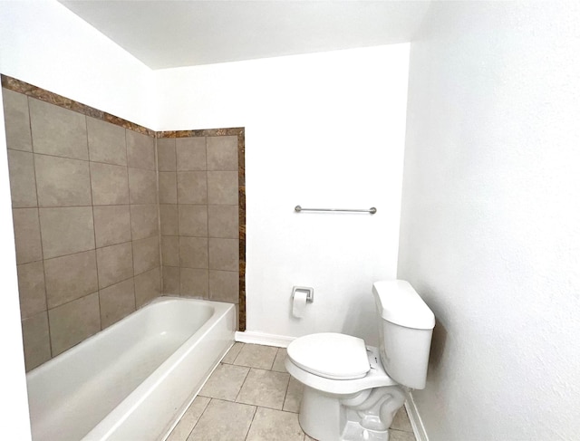 bathroom with tile patterned floors and toilet