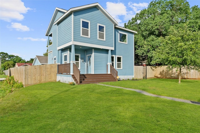 view of front of home with a front lawn