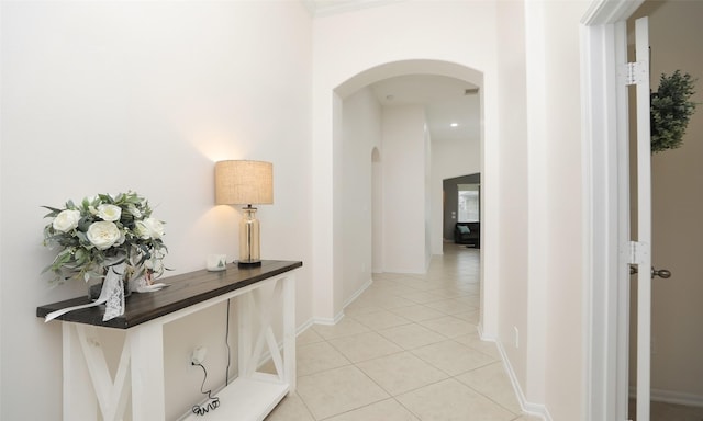 corridor featuring light tile patterned flooring