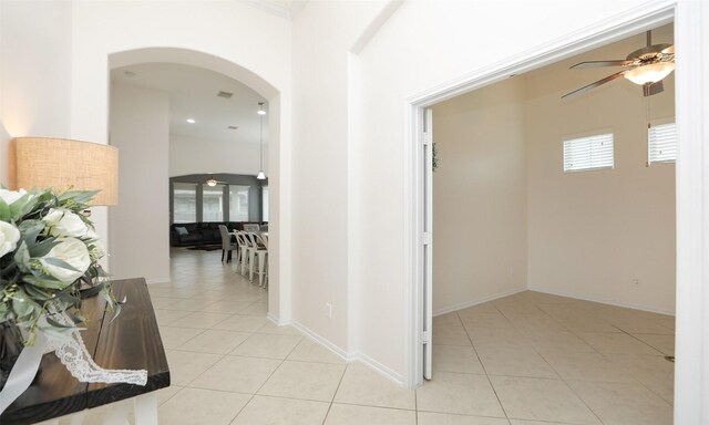 hallway with light tile patterned floors