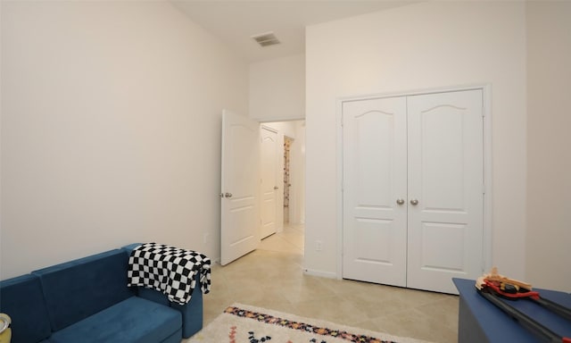 sitting room with light tile patterned floors