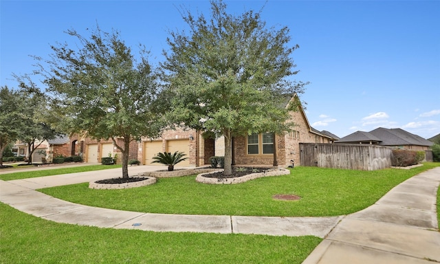 view of front facade with a garage and a front yard