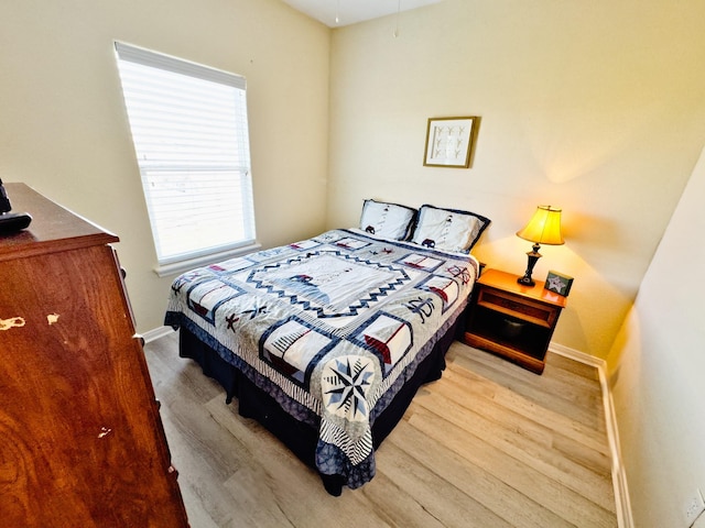 bedroom featuring light hardwood / wood-style floors