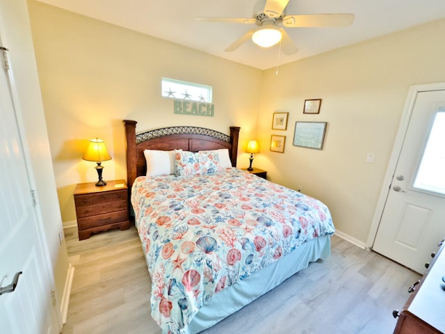 bedroom featuring light wood-type flooring and ceiling fan