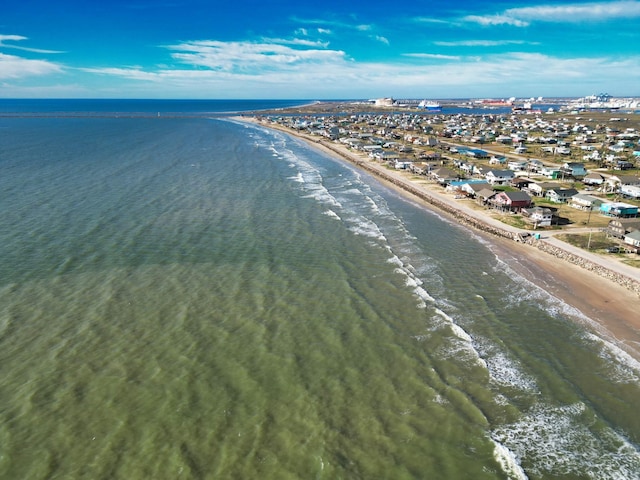 aerial view featuring a water view and a view of the beach