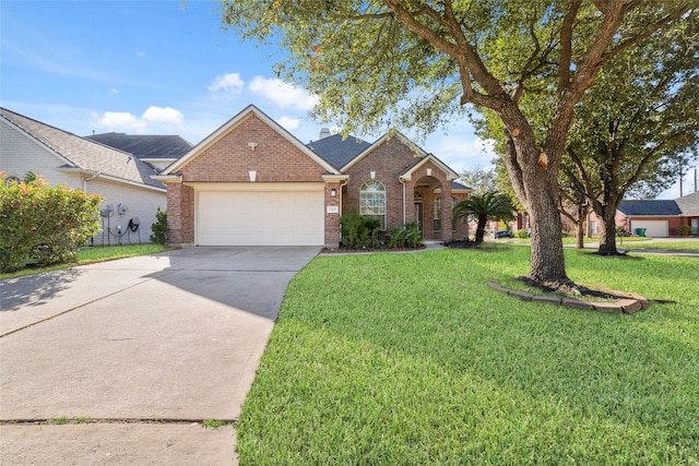 view of front of home featuring a front yard and a garage