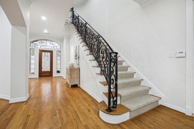 foyer entrance with light hardwood / wood-style flooring