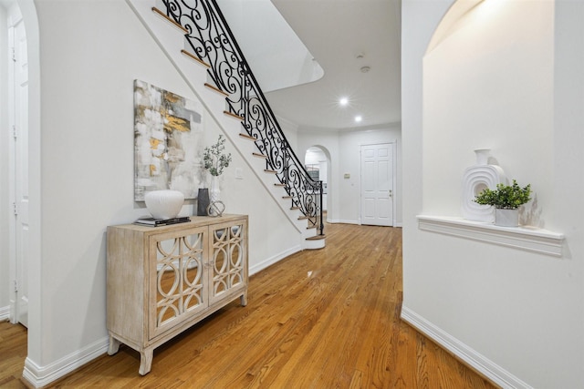 foyer featuring wood-type flooring