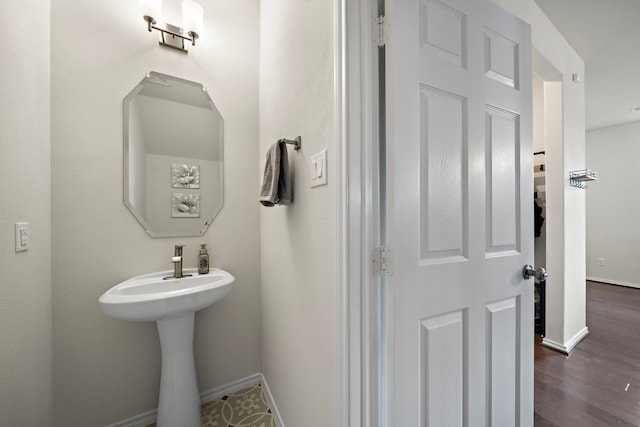 bathroom featuring hardwood / wood-style flooring