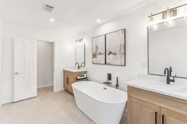 bathroom featuring a bathtub and vanity