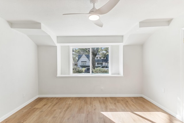 bonus room with light hardwood / wood-style floors and ceiling fan