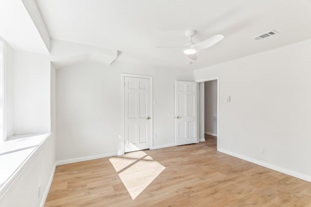 interior space with light hardwood / wood-style flooring and ceiling fan