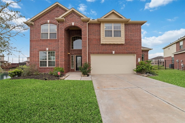 view of front property featuring a front yard and a garage