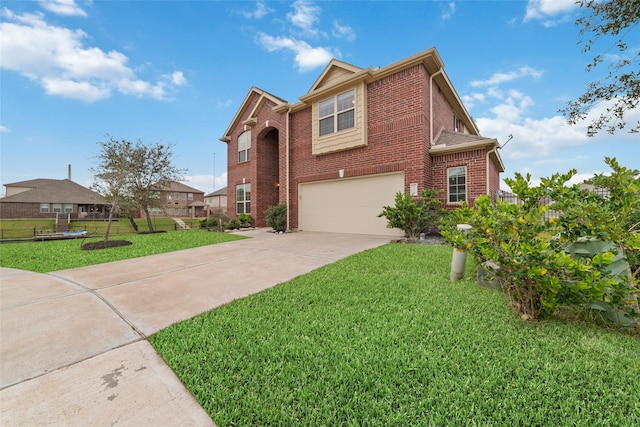 view of front facade featuring a garage and a front yard