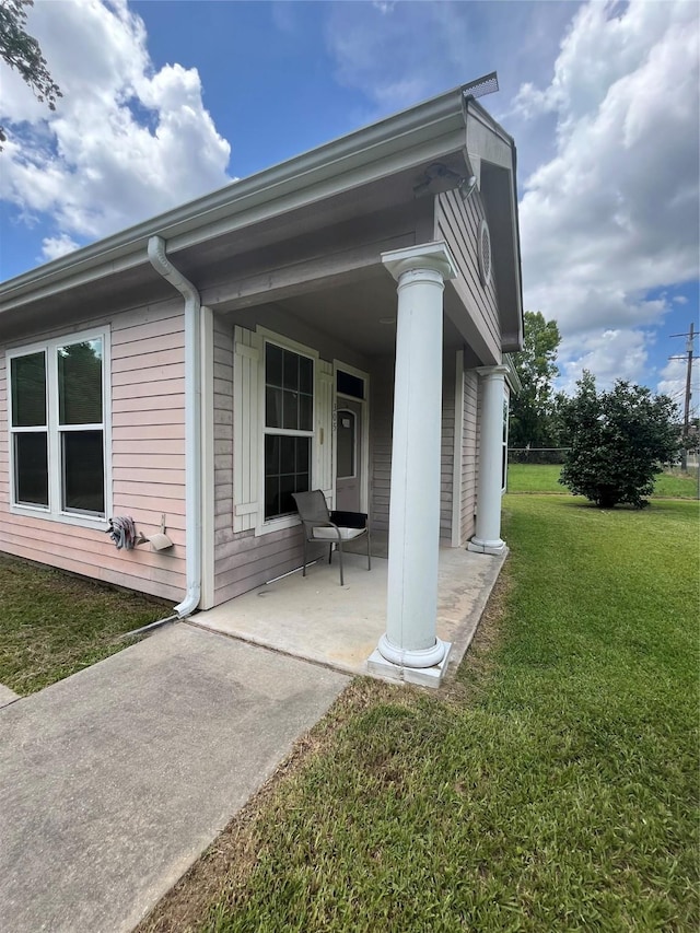 exterior space featuring a yard