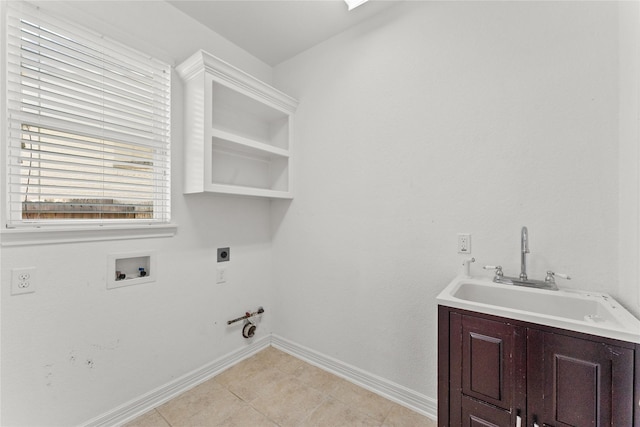 laundry area with light tile patterned flooring, sink, washer hookup, hookup for an electric dryer, and hookup for a gas dryer