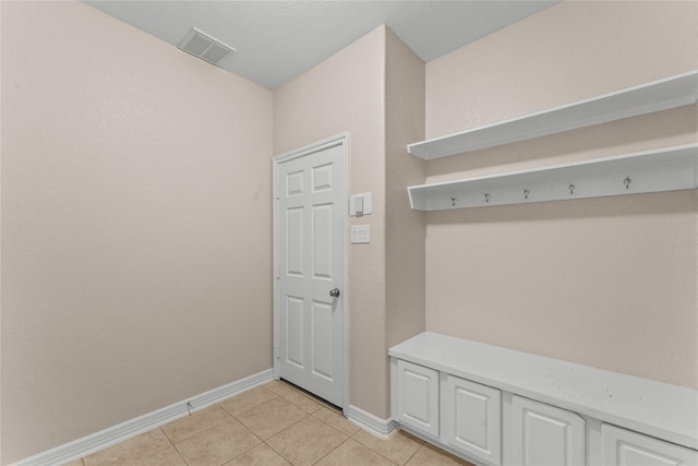 mudroom featuring light tile patterned floors