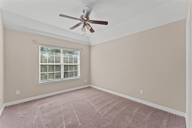 spare room with carpet floors and ceiling fan