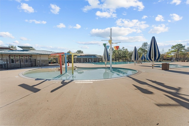 view of pool featuring a patio