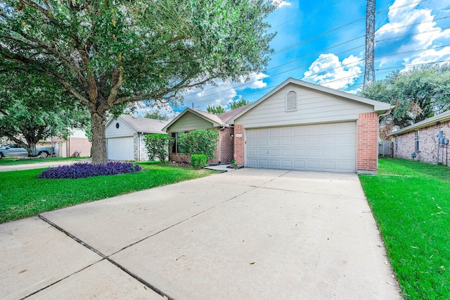 single story home featuring an outdoor structure, a front yard, and a garage