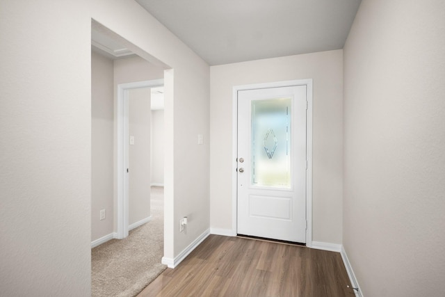 doorway featuring hardwood / wood-style floors