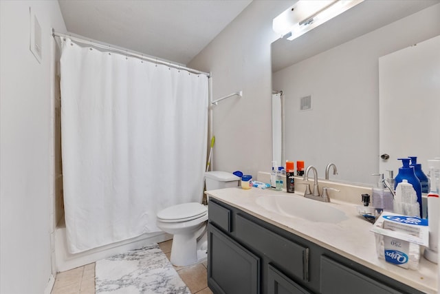 full bathroom featuring tile patterned flooring, vanity, toilet, and shower / tub combo with curtain