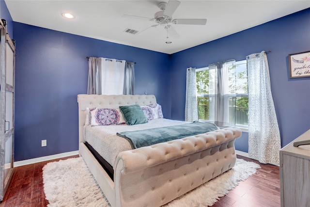 bedroom featuring wood-type flooring and ceiling fan