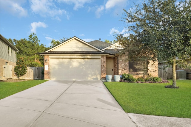 view of front facade featuring central air condition unit, a front yard, and a garage