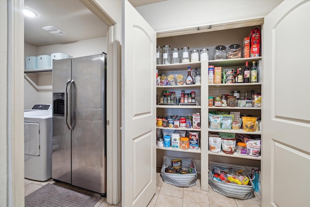 pantry featuring washer / dryer