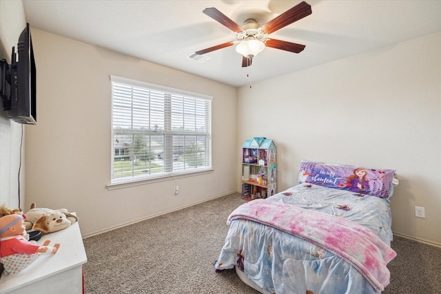 carpeted bedroom featuring ceiling fan