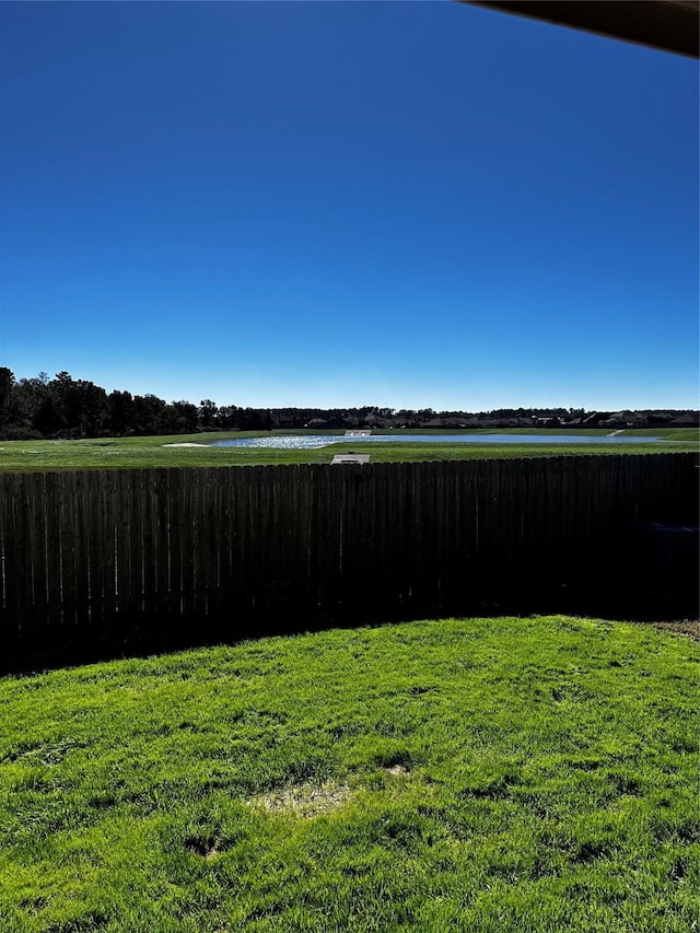 view of yard with a water view